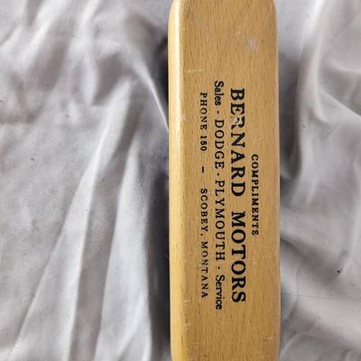 Antique marketing giveaway lint or upholstery brush.