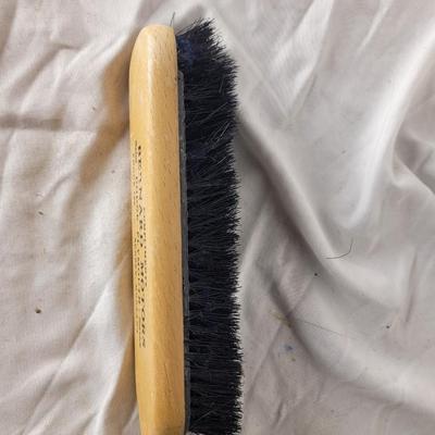 Antique marketing giveaway lint or upholstery brush.