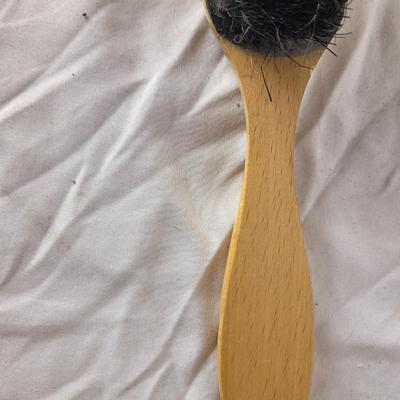 Antique marketing giveaway lint or upholstery brush.
