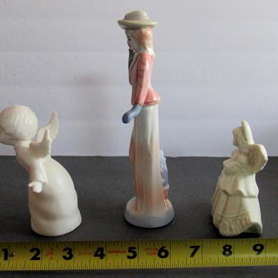 Lot 380: Ceramic Figure and Angels