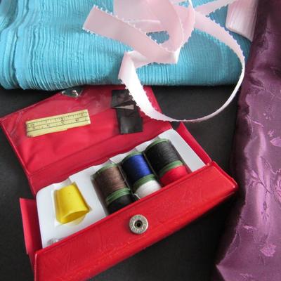 Lot 400: Pretty Unused Fabric and Small Sewing Kit