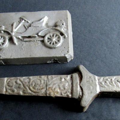 Lot 409: Two Heavy Cast Metal Objects