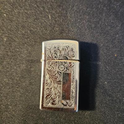 Assortment of Pocket Knives and a Zippo (LR-DW)