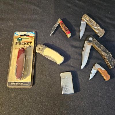 Assortment of Pocket Knives and a Zippo (LR-DW)
