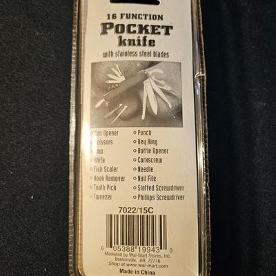 Assortment of Pocket Knives and a Zippo (LR-DW)