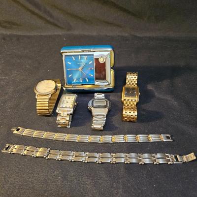 Men's Wrist Watches, Wrist Bands and a Bulova Travel Clock (LR-DW)