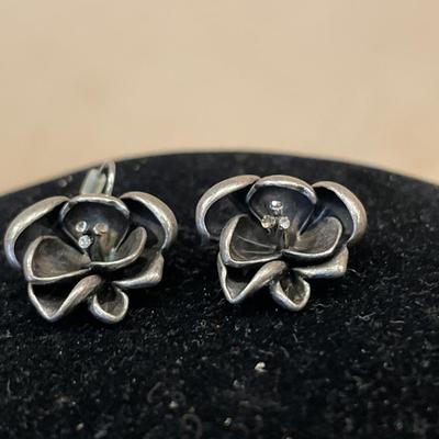 Matching silver tone flower set