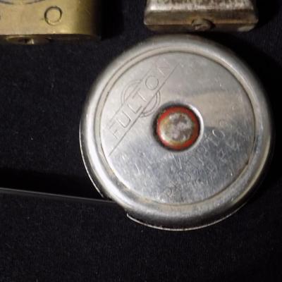 Vintage padlocks and measuring tapes