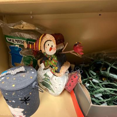 Christmas items with shelving unit