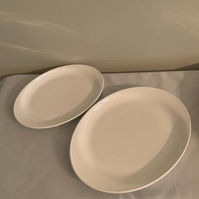 Assortment of large white serving platters