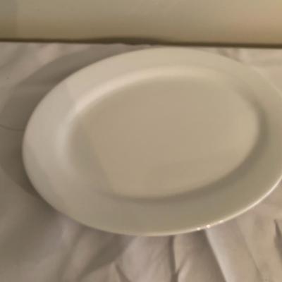 Assortment of large white serving platters