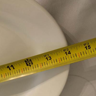 Assortment of large white serving platters