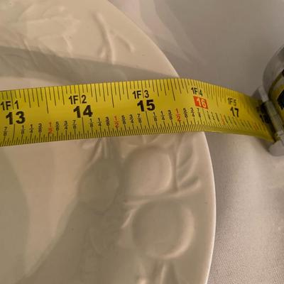 Assortment of large white serving platters