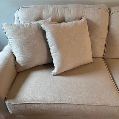 LOT 6: Cream Sofa and Throw Pillows