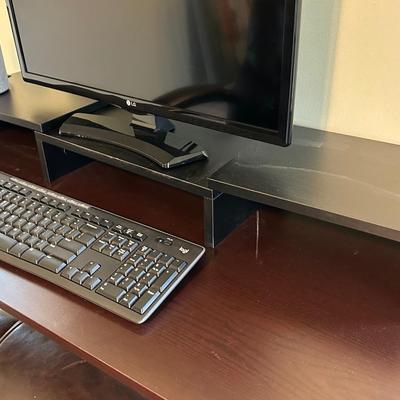LOT 50: Desk, Chair, Computer Monitor, Keyboard and Amazon Speaker