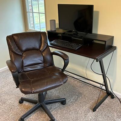 LOT 50: Desk, Chair, Computer Monitor, Keyboard and Amazon Speaker