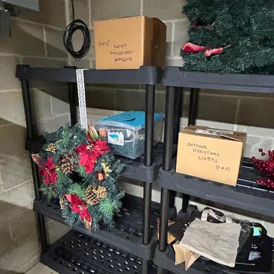 LOT 59: Two Plastic Storage Shelf Units with Holiday Decorations and More