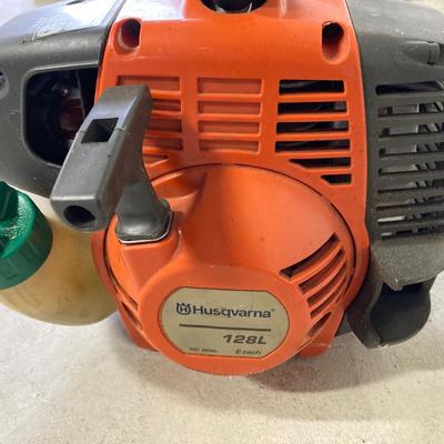 LOT 104: Outdoor Gas Powered Lawn and Garden Power Tools - Husqvarna Weed Trimmer and Ryobi Leaf Blower