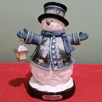 LOT 21: Thomas Kinkade Santa and Snowman Figurines w/ Plastic Clocks & Mini Welcome Sign