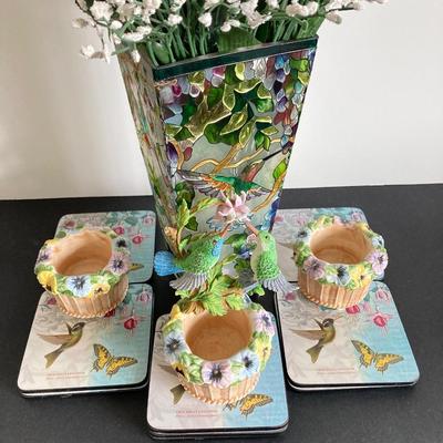 LOT 106: Hummingbird Collection: Painted Stained Glass Vase, Coasters along with Yankee Candle Votive Pansy Holders
