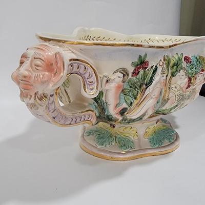 Massive Italian figural horned face handle bowl.