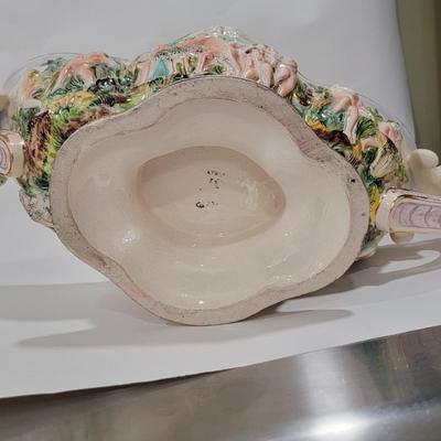 Massive Italian figural horned face handle bowl.