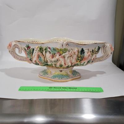 Massive Italian figural horned face handle bowl.