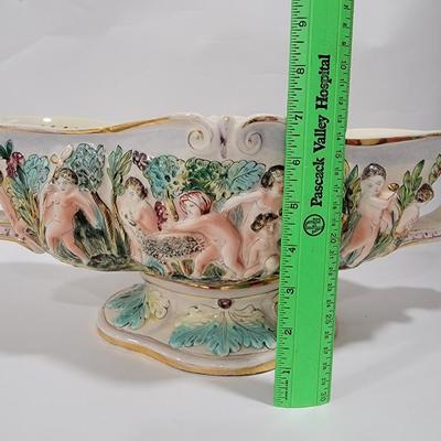 Massive Italian figural horned face handle bowl.