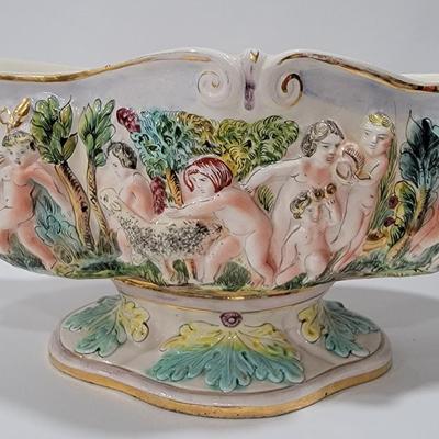 Massive Italian figural horned face handle bowl.