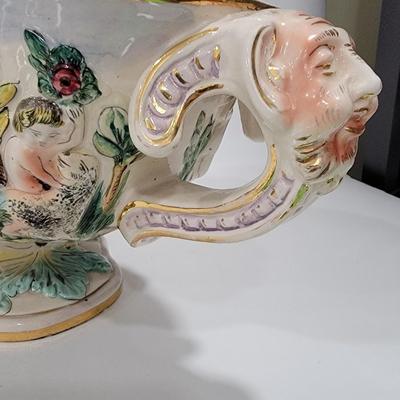 Massive Italian figural horned face handle bowl.