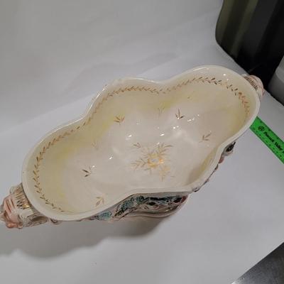 Massive Italian figural horned face handle bowl.