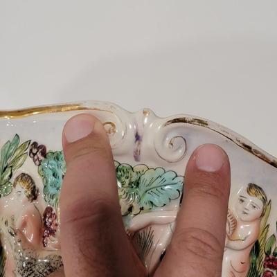 Massive Italian figural horned face handle bowl.