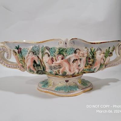 Massive Italian figural horned face handle bowl.