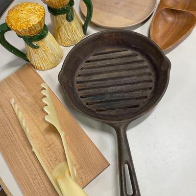 Cast iron skillet and wood kitchen items