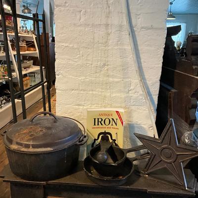 1452 Cast Iron Lot = Wagnerware Roaster, Bookends, Two small skillets, Ice Shaver