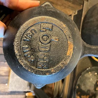 1452 Cast Iron Lot = Wagnerware Roaster, Bookends, Two small skillets, Ice Shaver