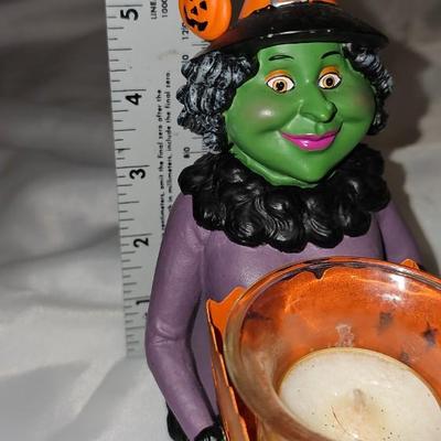 Cute witch with dangly legs candle holder