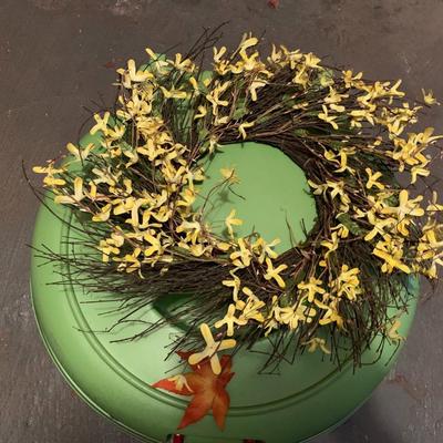 Assortment of faux flower wreaths with storage case