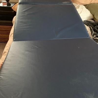 Folding padded tumbling/exercise mat