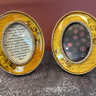 PAIR OF OVAL PICTURE FRAMES BY JOHN WIND OF MAXIMAL ART