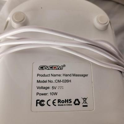 CINCOM hand massager with heat.