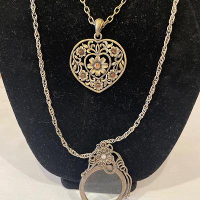 Large heart and magnifying glass pendant necklaces