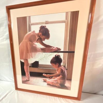 Ballerina dancers with decorative pillow