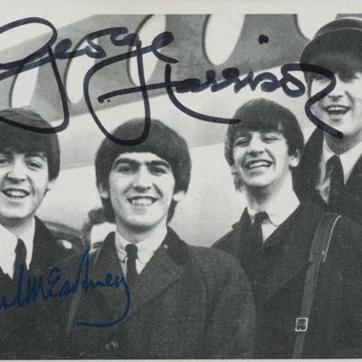 The Beatles George Harrison signed photo. GFA Authenticated