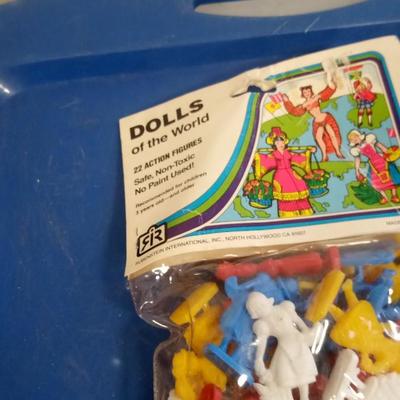 LOT 73 TWO BAGS OF PLASTIC DOLLS OF THE WORLD