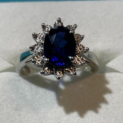 Vintage Sterling Silver Blue Stone CZ Cocktail Ring Size 6-3/4 in VG Preowned Condition as Pictured.