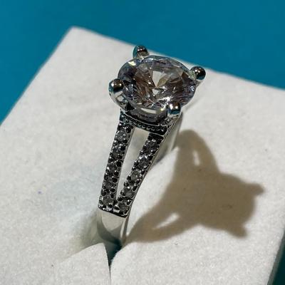 Vintage Silver-toned Fashion CZ Engagement Style Ring w/Center CZ Stone Measuring about 2-Carats in VG Preowned Condition.