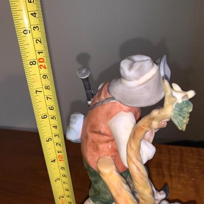 Vintage Bisque figure hunter with dog
