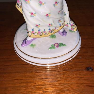 Porcelain figure of woman with shawl and hat, Meissen Crossed Swords Mark