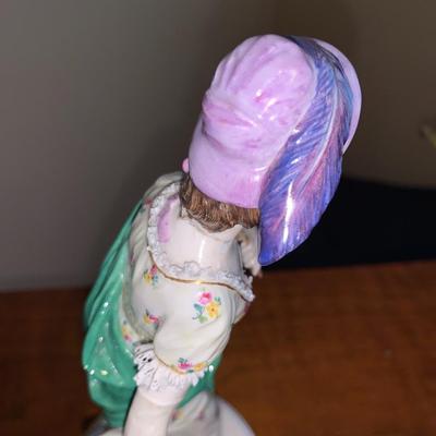 Porcelain figure of woman with shawl and hat, Meissen Crossed Swords Mark